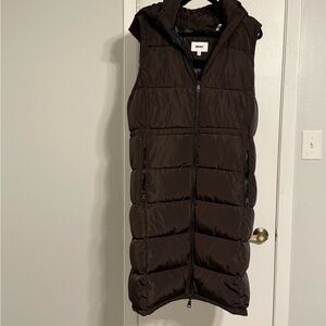 Brand New never worn full length puff sleeveless jacket/vest.
